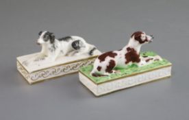 Two Minton porcelain figures of a recumbent setter and a pointer, c.1831-40, the black and white