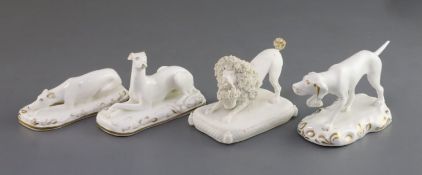 Four Grainger, Lee & Co. porcelain figures of dogs, c.1820-37, comprising a pair of recumbent