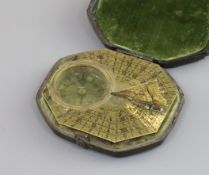 A French brass Butterfield pattern sundial, with elongated octagonal plate divided into three hour