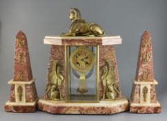 An early 20th century French ormolu and marble Egyptian revival clock garniture, with portico