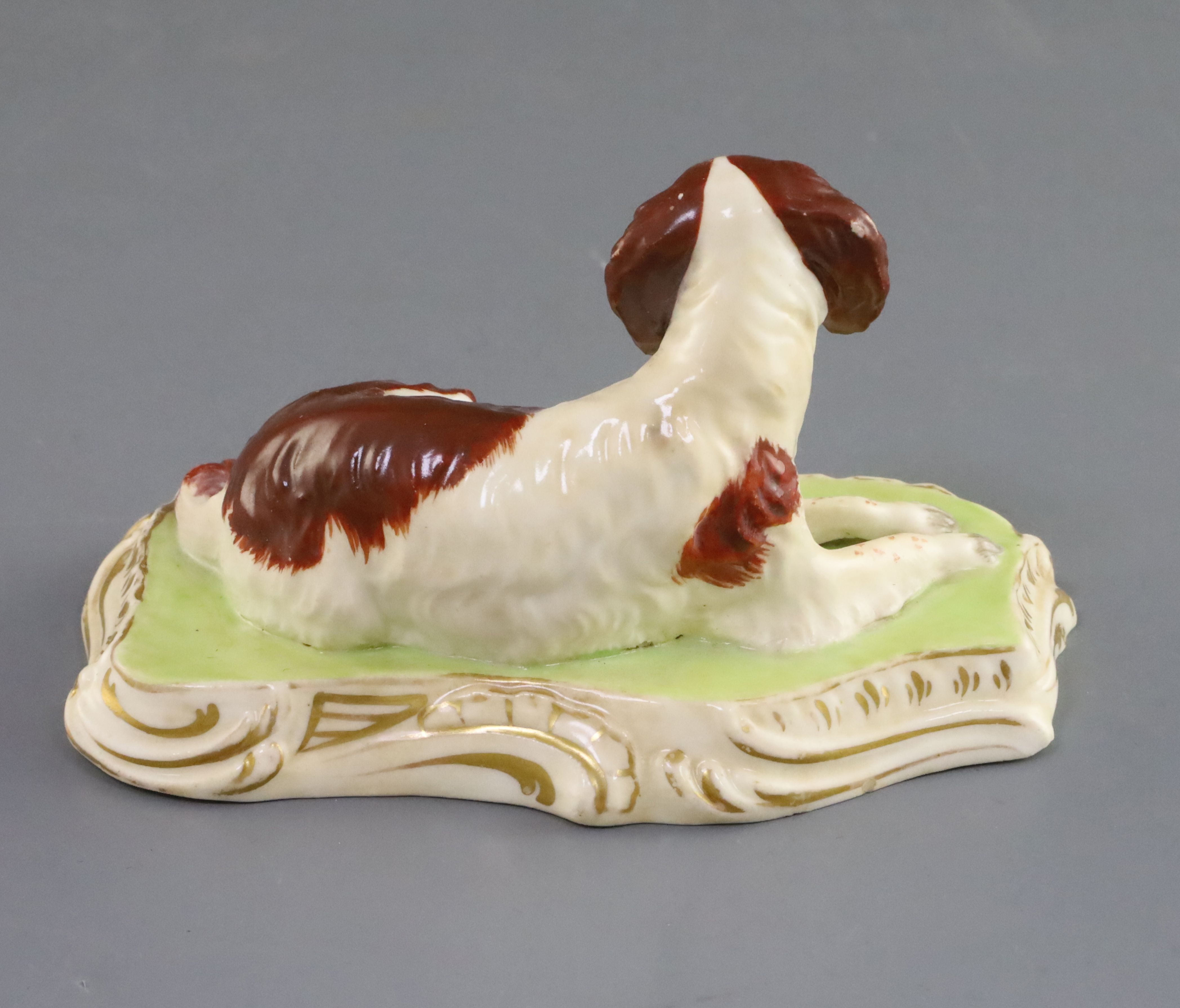 A Copeland and Garrett porcelain figure of a King Charles Spaniel, c.1833-47, recumbent on a green - Image 2 of 3