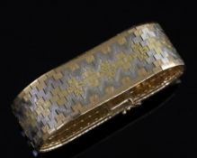 A 1960's 18ct three colour gold brick link bracelet, 17.2cm, 80.9 grams.