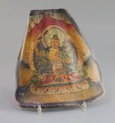 A Tibetan thangka depicting Bodhisattva painted on an ox shoulder bone, late 19th century, H. 20.