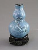 A Chinese robin's egg glazed double gourd joss stick holder, 18th/19th century, moulded with a