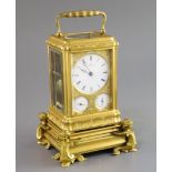 Grohe of London. A Victorian ormolu hour repeating calendar carriage clock, in ornate engraved gorge
