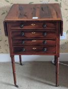 A Regency rosewood four drawer work table, on ring turned tapered legs, W.1ft 6.5in. D.1ft 4.5in.