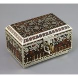 An Erhard and Sohne silvered metal and burr wood casket, decorated with dog roses, 5in., with key
