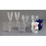 A set of eight Waterford cut glass wines, four Regency rummers and a group of tumblers