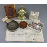 A group of assorted curios including a Thomas Carlisle brass commemorative casket, 6.25in., a