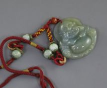 A Chinese jadeite 'Budai' pendant, 4.8cm