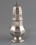 A George I Brittania standard silver octagonal castor, by William Spackman, with turned finial,
