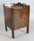 A George III ebony strung mahogany tray top commode, with two doors and base drawer, on squared legs