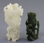 A Chinese archaistic white jade rhyton and a spinach green jade vase, 18th/19th century, the phoenix