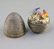 A 1970's textured silver gilt surprise egg by Stuart Devlin, no. 256, opening to reveal two