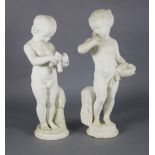 A pair of 19th century Italian carved white marble figures of putti, one holding a bird's nest,