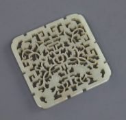 A Chinese pale celadon jade square plaque, 19th century, pierced and carved with 'shou'