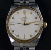 A gentleman's 1950's? stainless steel and gold Rolex Oyster Perpetual Air King wrist watch, with