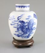 A Chinese blue and white 'qilin' jar and cover, Kangxi period, painted with two qilin, flaming