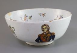 Lord Admiral Nelson. A commemorative Delftware punch bowl, 19th century, painted in polychrome