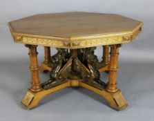 A Victorian Gothic revival golden oak centre table, with octagonal top, the underframe carved with