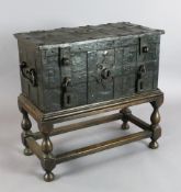 A 17th century iron Armada chest, with strap work construction, ornate inner lock to the lid and