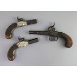 A pair of early 19th century Lacey & Co of London box lock muff pistols, with octagonal barrels, 5.