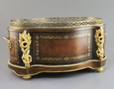 A 19th century French ormolu mounted brass inset specimen wood jardiniere, of serpentine oval