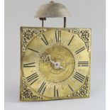 An early 18th century brass and wrought iron birdcage dial wall clock, with verge escapement,