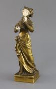 Eugene Bernoud (19th C.). A bronze and ivory figure of La Liseuse, signed, 10.25in.