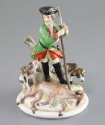 A Meissen group of a huntsman with hounds and prey, 19th century, incised model no. '223',