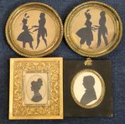 A pair of early Victorian cut paper silhouettes of dancing couples, tondo, 5in. a cut and painted