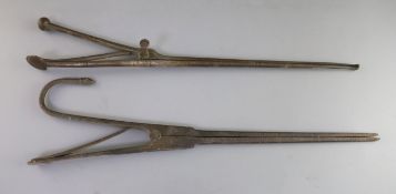 Two pairs of 18th century steel pipe tongs, 18in.