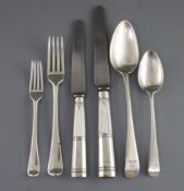 A matched part canteen of George III silver Old English pattern flatware by George Smith & William