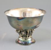 A Georg Jensen planished sterling silver pedestal bowl, design no. 197B, with 'leaf and berry'