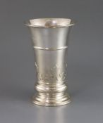 A late Victorian silver flower vase by Carrington & Co, of flared form, with card cut decoration,