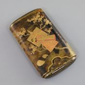 A Japanese gilt lacquered tortoiseshell cigar case, Meiji period, decorated with a boat and peonies,