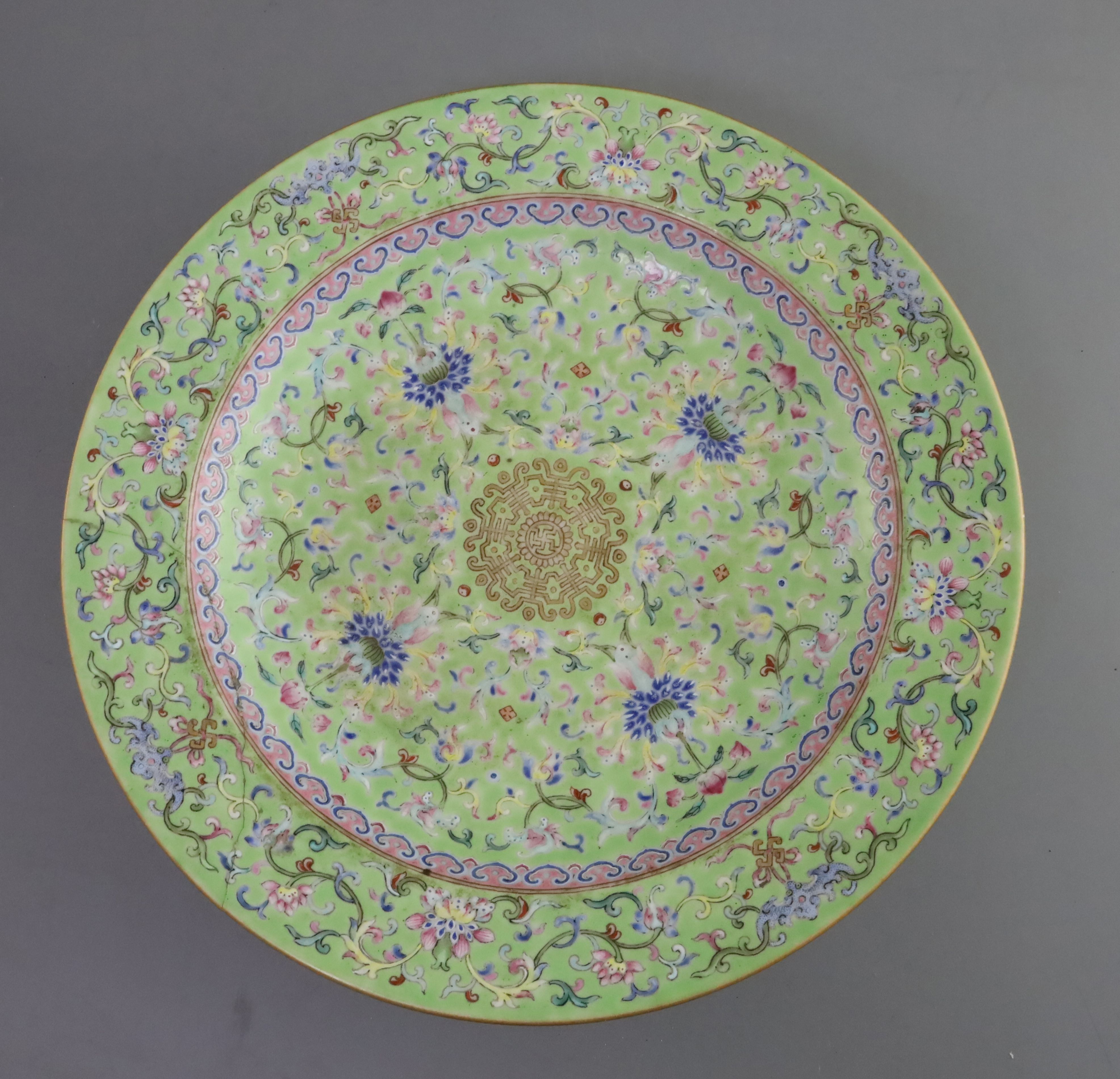 A Chinese lime green ground footed dish, Daoguang seal mark and of the period (1821-1850), finely - Image 2 of 3