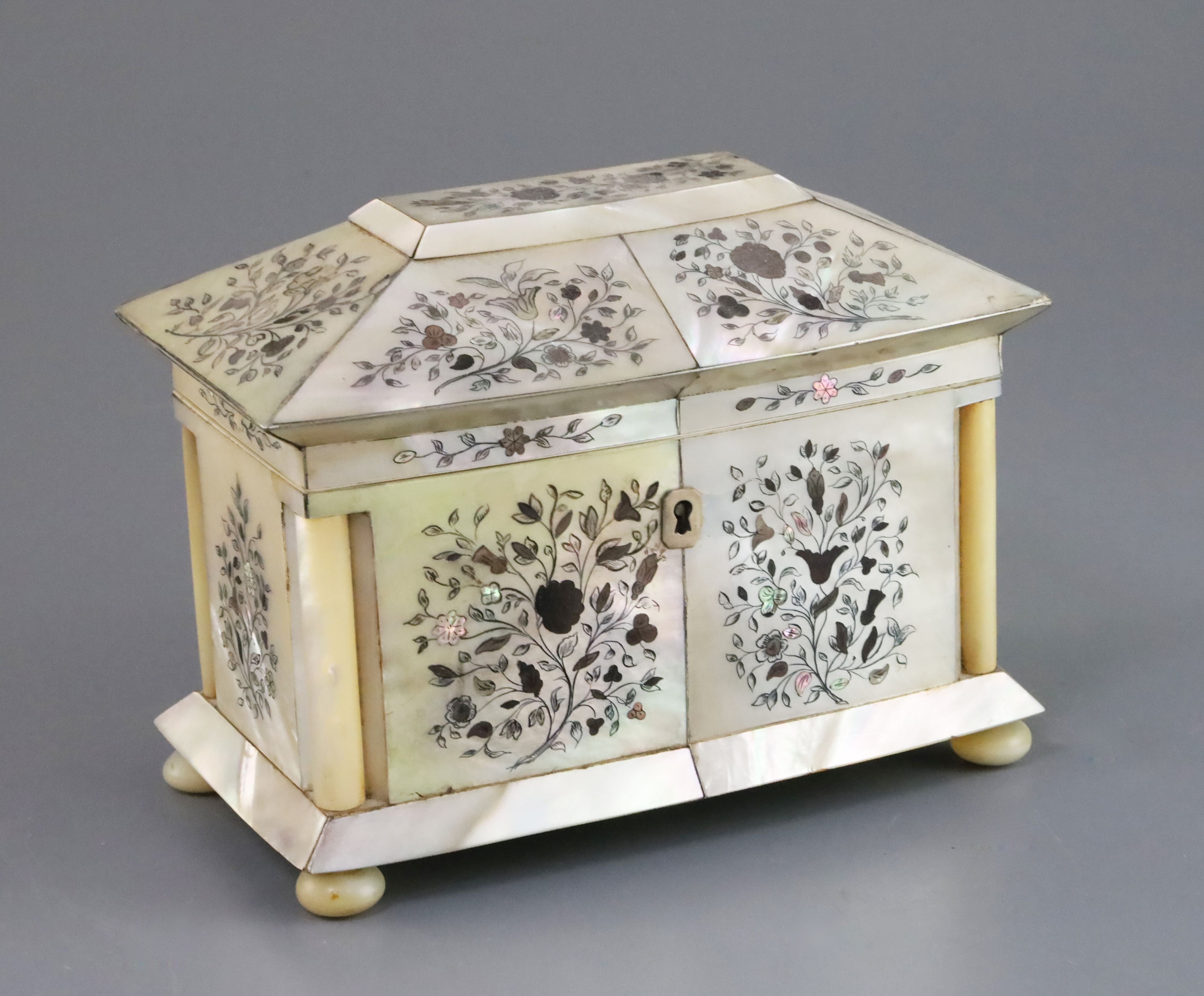 A Regency engraved and inlaid mother of pearl sarcophagus tea caddy, with bowfront and two