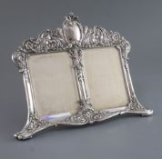 A late 19th/early 20th century Tiffany & Co Art Nouveau sterling silver double photograph frame,
