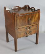 A George III mahogany tray top commode, with two door compartment and double dummy base drawer, W.