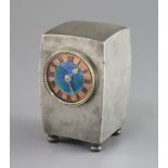 A Liberty & Co. Tudric pewter and enamel timepiece, model no.0756, of swollen rectangular form on