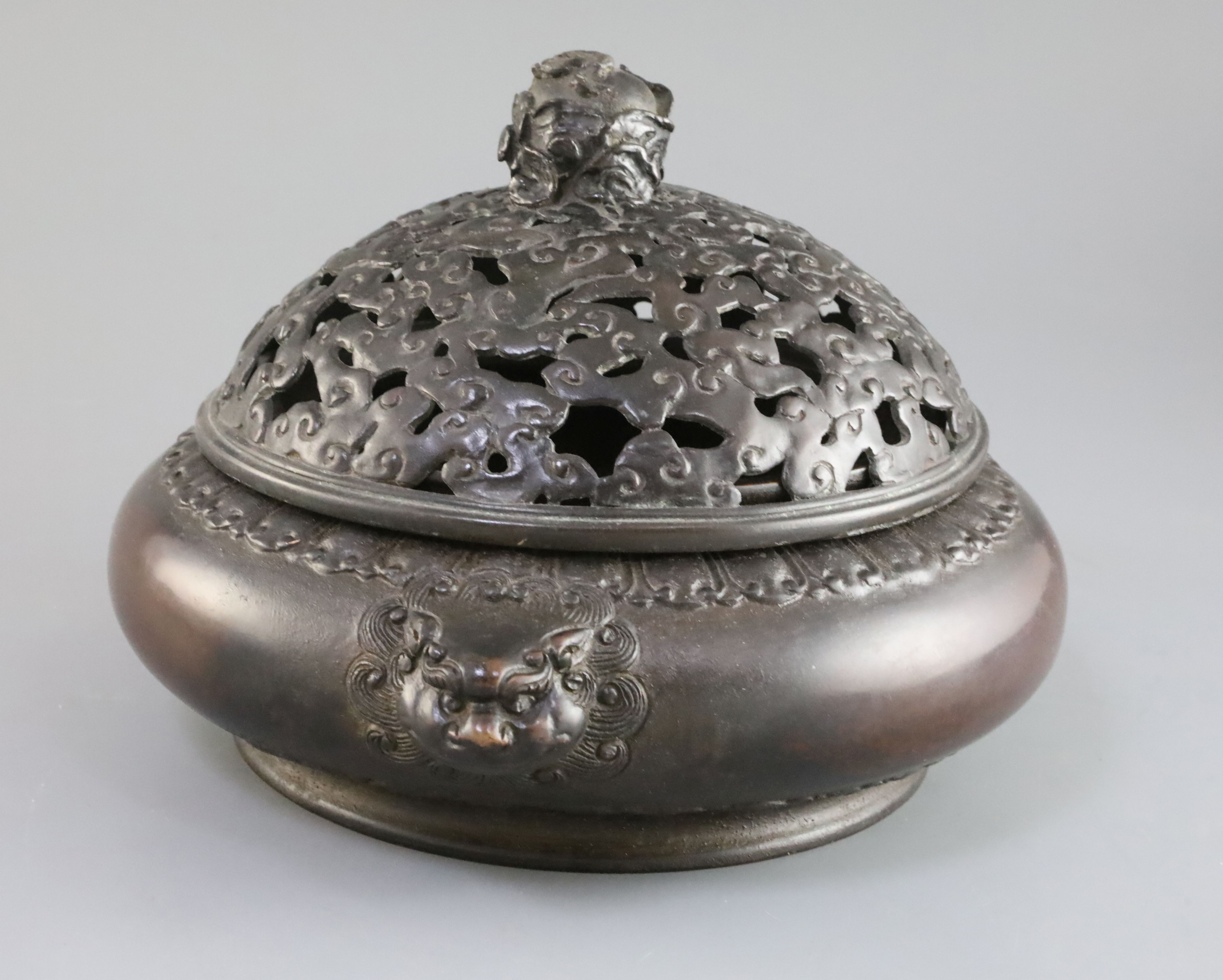 A large Chinese bronze censer, 17th/18th century with 16th/17th century bronze cover, the compressed - Image 2 of 4