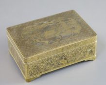 A fine Japanese gold and silver damascened iron box by Komai, Meiji period, the cover decorated with