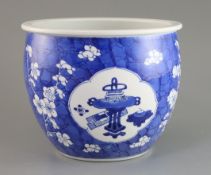 A small Chinese blue and white 'Antiques' jardiniere, Kangxi period, painted with scholar's