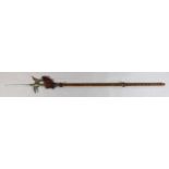 A Continental steel halberd, with pierced blade and velvet covered shaft, 87in.