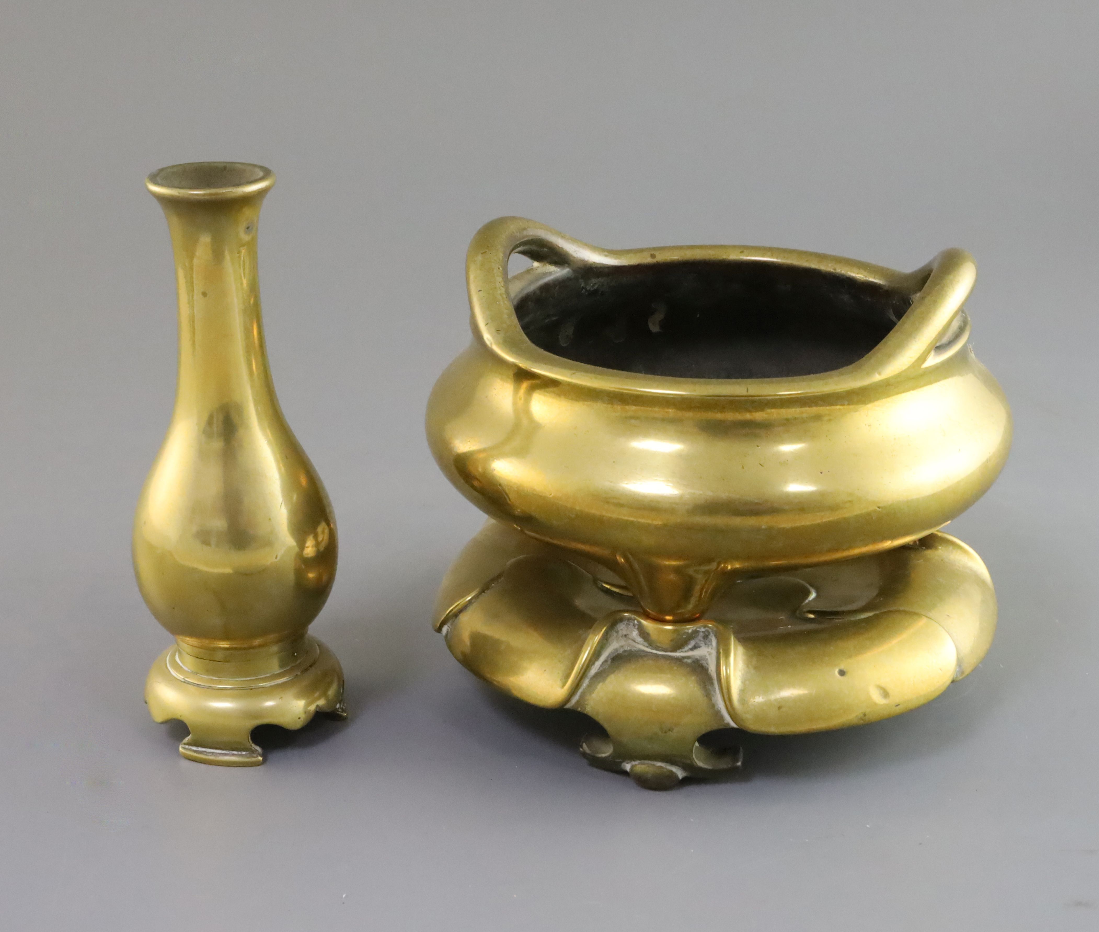A Chinese polished bronze censer with stand and a similar bottle vase, 17th/18th century, the tripod - Image 2 of 3