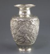 An early 20th century Persian silver vase, of baluster form and embossed with birds amongst
