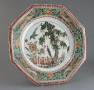 A large Chinese famille verte octagonal dish, Kangxi period, painted with two courting birds in a