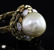 An 18ct gold, diamond and cultured pearl dress ring by John Donald, circa 1970, in modernist