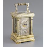 An early 20th century French silvered and parcel gilt hour repeating carriage alarum clock, in